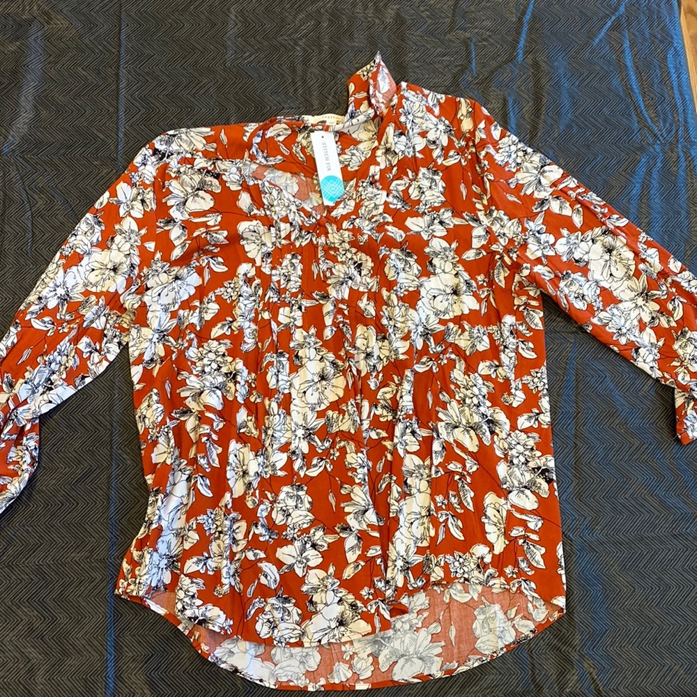 Brand new women’s detailed burnt orange blouse, tags on!